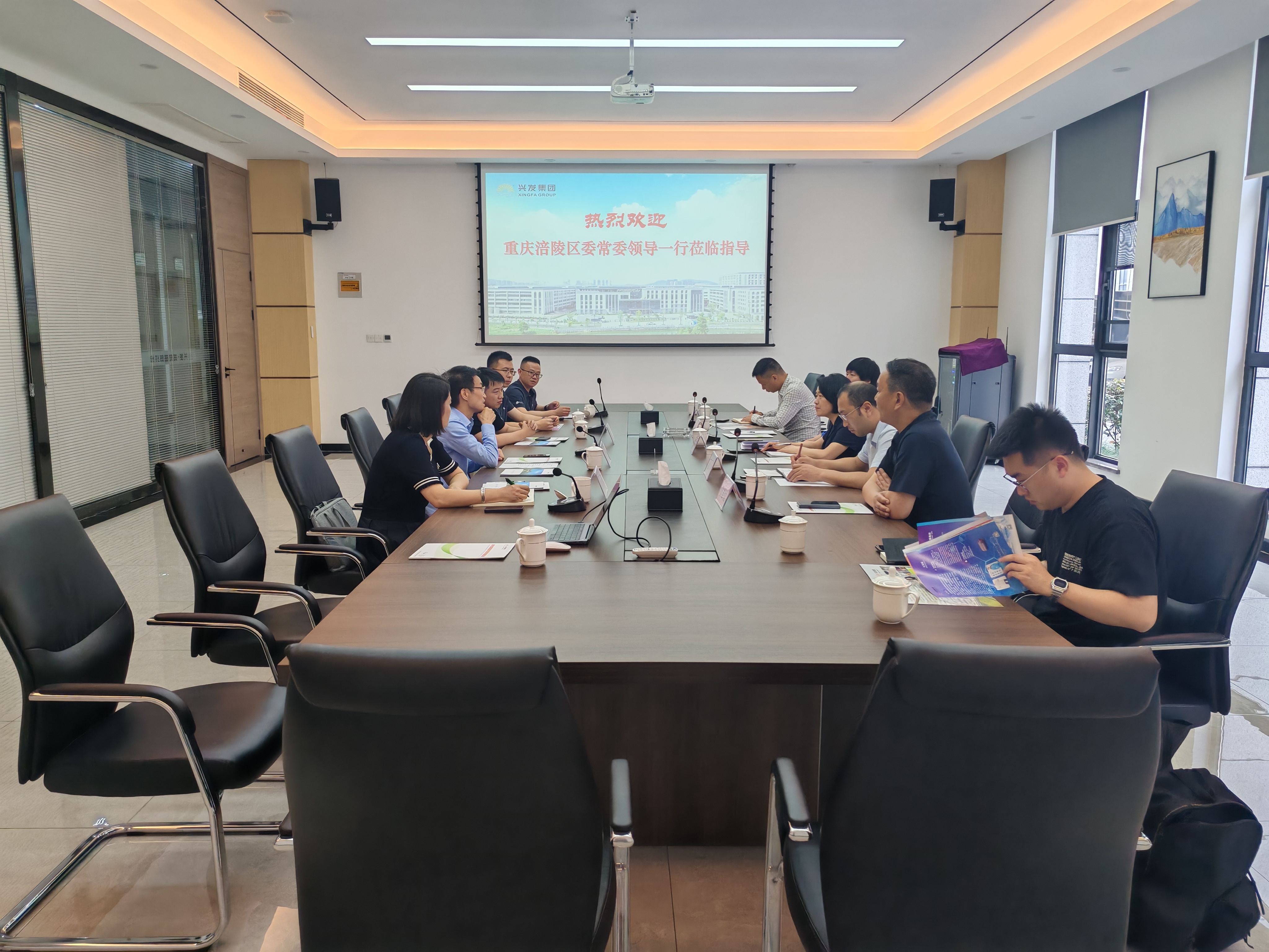 涪陵区委常委庹灿领导一行莅临诚邦高新纤维调研考察